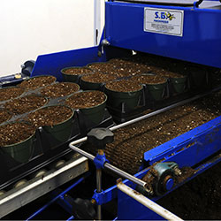 S.B. Machinerie Flat Fillers, Bale Breakers & Conveyor Systems